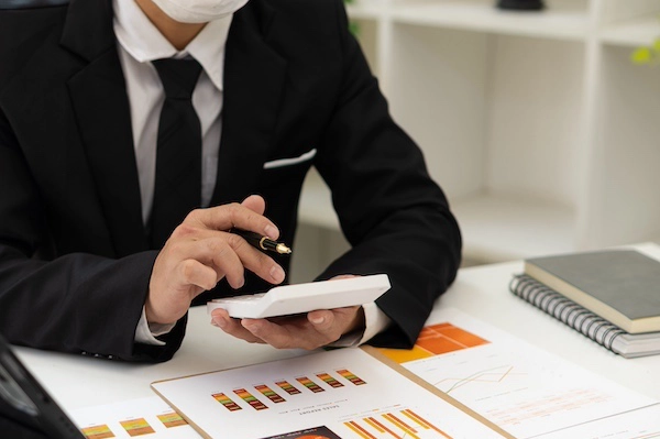 Man going over credit report errors Man going over credit report errors
